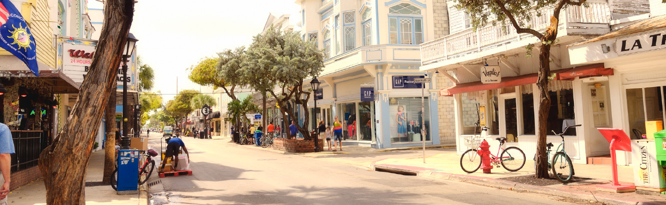 A busy street in a tropical city.